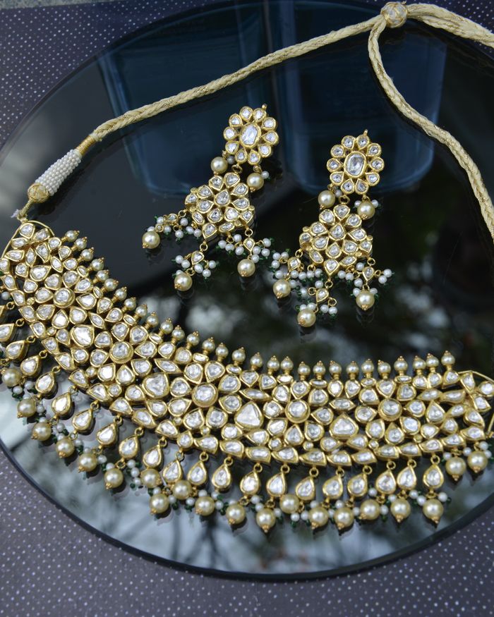 Kundan necklace and earring set with white gemstones