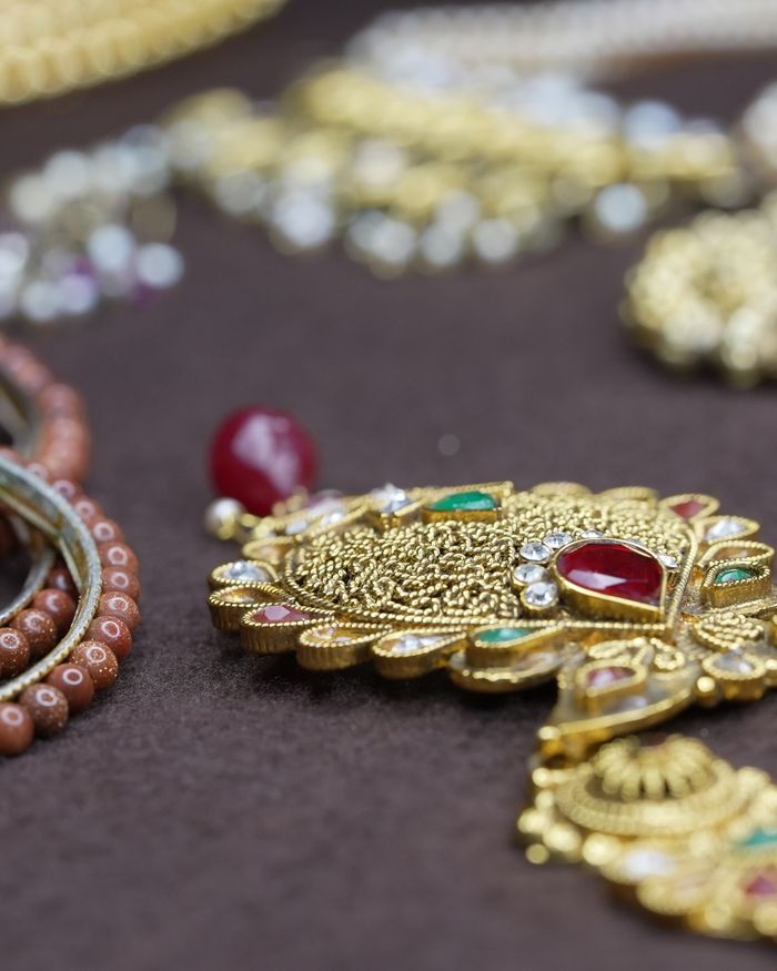 Close-up of ornate traditional Indian temple-style gold jewellery